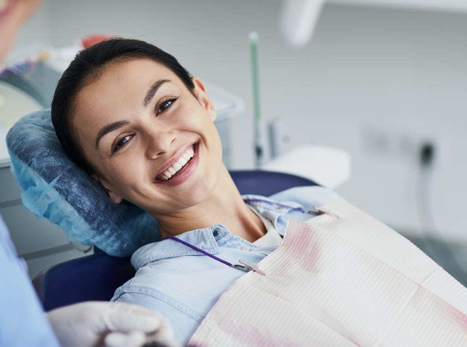 woman smiling after a tooth extraction in duncan