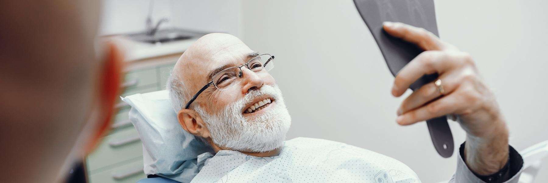 a patient smiling confidently after dental procedure