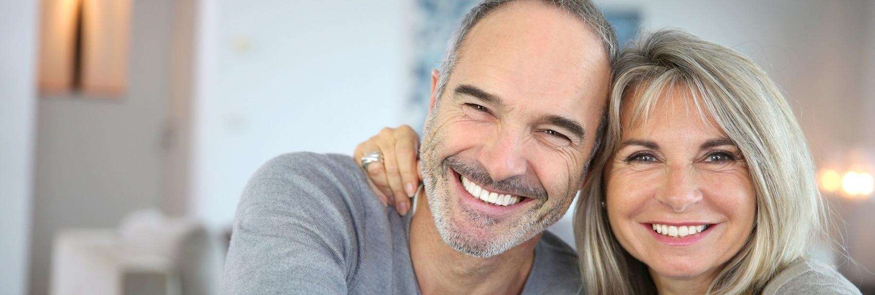 middle-aged man and woman smiling in duncan